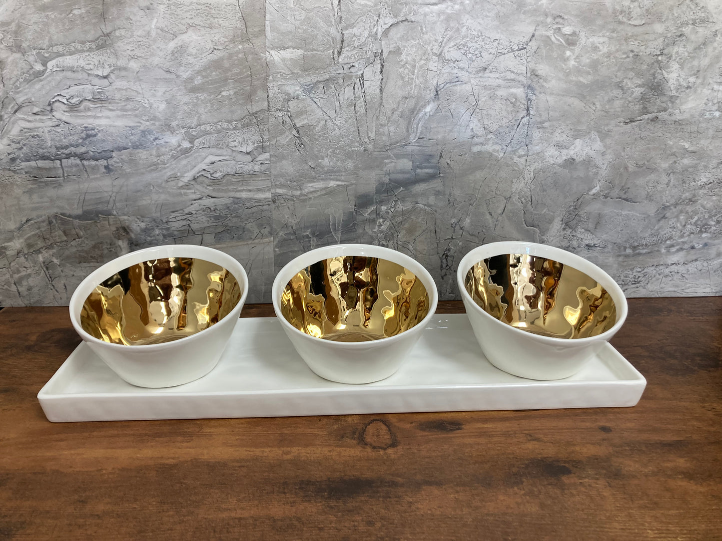 Serving 4 pcs white ceramic ( 3 round bowls and one rectangular shape tray) with gold color inside. Home decor.