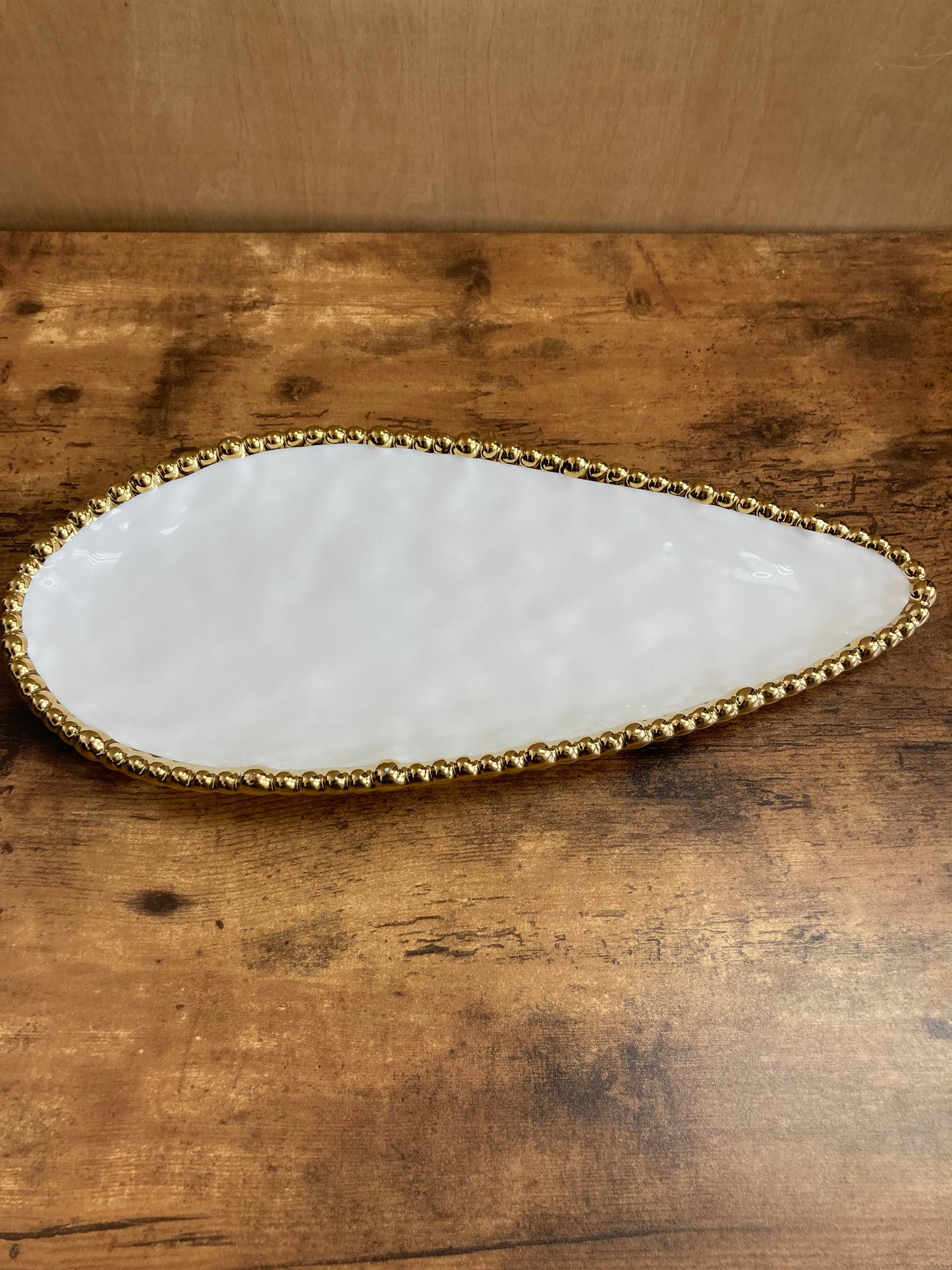 Serving dish tray plate fruits pastry food ,ceramic with gold rim uneven oval shape.