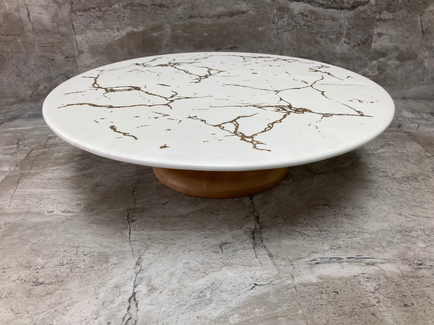 Cake stand with wooden base ceramic top marble pattern ,elegant and classy.