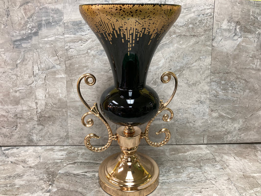 Flower vase glass black color with gold design and metal stand. Home decor .