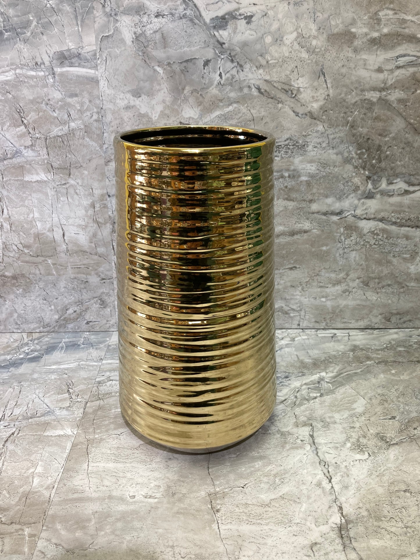 Flower vase  Gold color .Made of ceramic elegant and classy home decor.