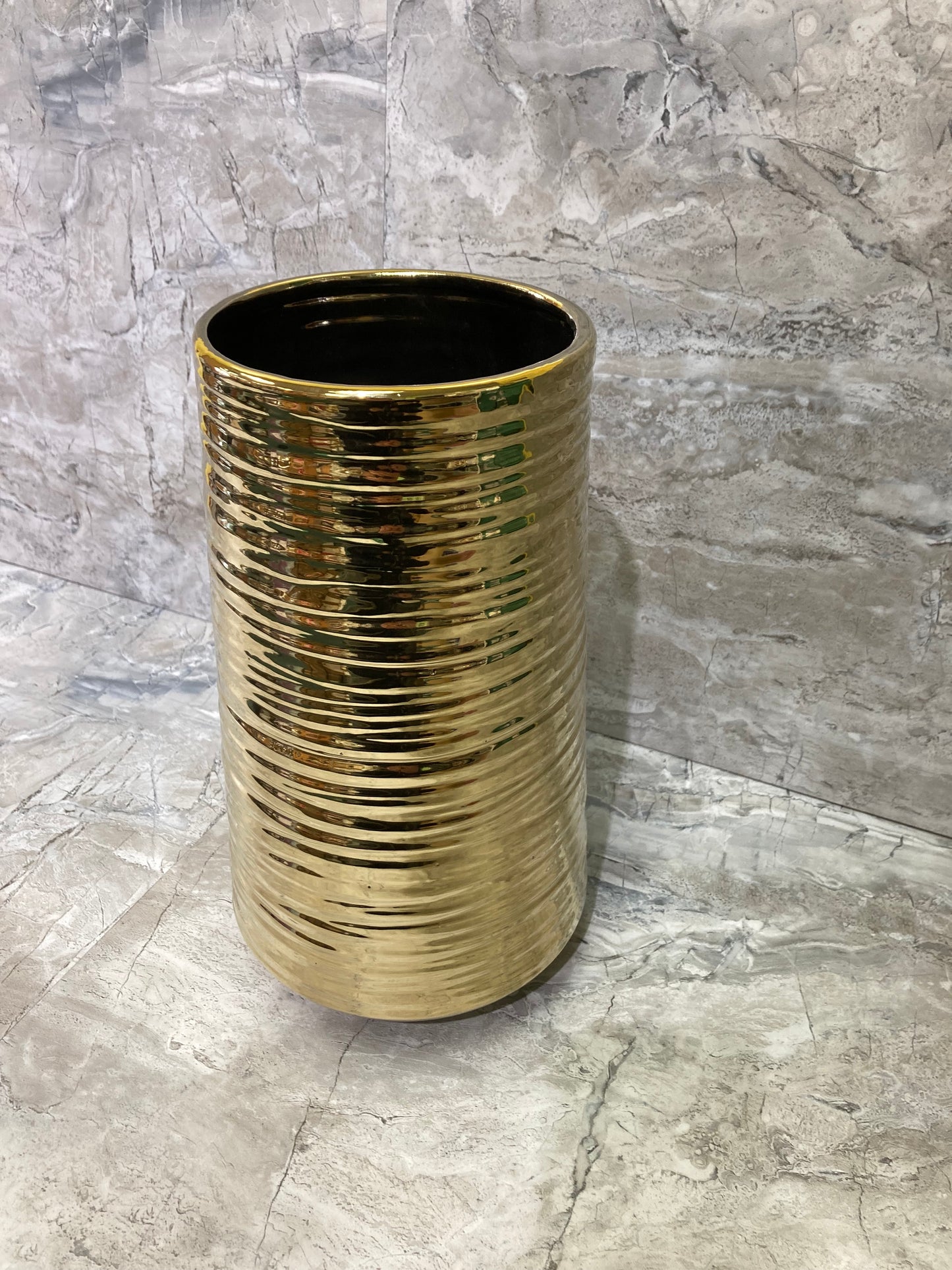 Flower vase  Gold color .Made of ceramic elegant and classy home decor.