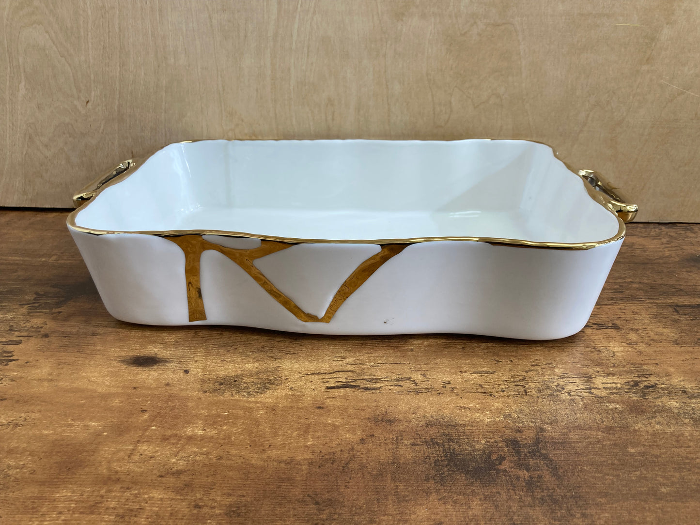 Serving white ceramic plater plate tray rectangular with gold color pattern. Home decor table top.