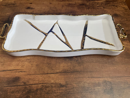 Serving white ceramic plater plate tray rectangular with gold color pattern. Home decor table top.