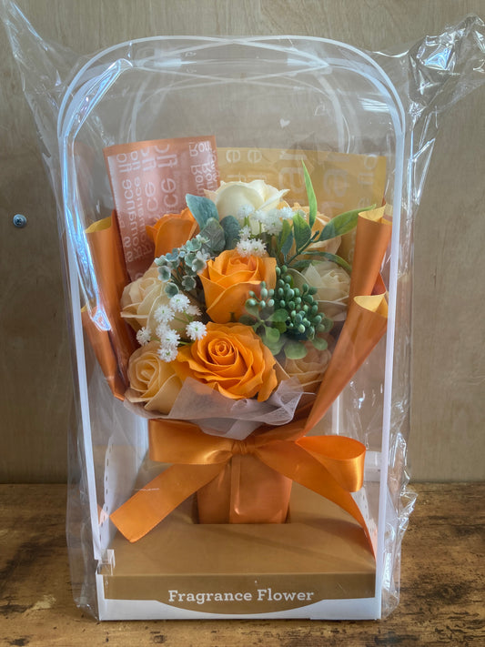Flower artificial bouquet gift with led light. Orange roses .