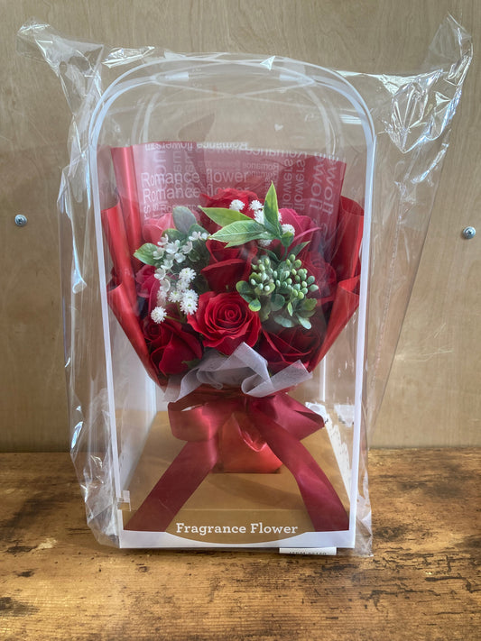 Flower artificial bouquet gift with led light. Red roses .