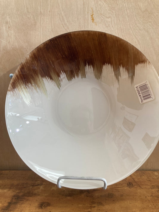 Serving plate tray platter made of glass with original and modern pattern home decor .